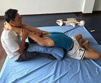 Enhance spinal extension with upward scapula rotation