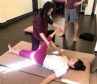 Yoga practitioners use stretching to refine their postural alignment