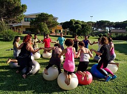 RSM is offering a program focused on postural correction, which utilizes balance ball yoga methods, in Sardinia, Italy