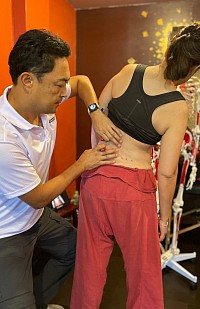 Analyze the lumbar spine's mobility to identify the cause of pain
